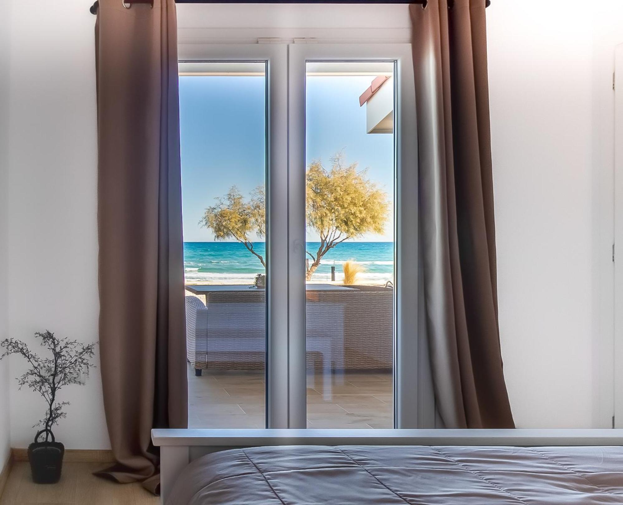 Vakantiehuis Seafront Wooden House Vounaraki 4 Katastárion